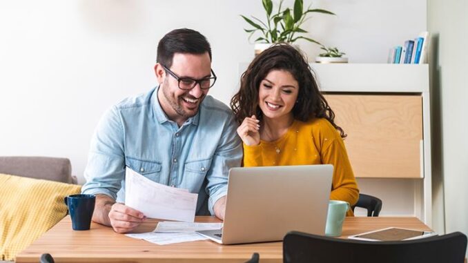 young-couple-applying-for-mortgage-loan-online